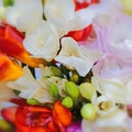 Colorful freesia flowers top view, natural background Royalty Free Stock Photo