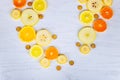 Colorful fresh fruit on white table. Orange, tangerine, lime, grapefruit. Fruit pattern. Summer food concept. Royalty Free Stock Photo