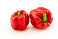 Colorful of fresh red sweet bell pepper (capsicum) stack on wh Royalty Free Stock Photo