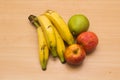 Colorful fresh summer fruits on yellow wooden background, healthy organic food on table, detox vitamin nutrition for health care. Royalty Free Stock Photo