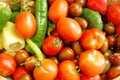 Colorful fresh tomatoes and peppers Royalty Free Stock Photo