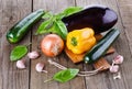 Colorful fresh vegetables over wooden background