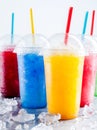 Colorful Frozen Fruit Slush Drinks in Plastic Cups Royalty Free Stock Photo