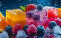 Colorful fruit cubes and berries frozen in ice, displayed amidst melting ice crystals. Royalty Free Stock Photo