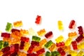 colorful fruit gum candy bears isolated with small shadow on white as a background frame