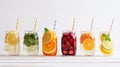 colorful fruit-infused water in a row of mason jars. Royalty Free Stock Photo