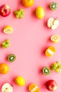 Colorful fruit mockup. Cut apple, kiwi, citrus on pink background top-down copy space Royalty Free Stock Photo