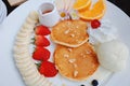 Fruit Pancakes maple syrup Royalty Free Stock Photo