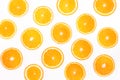 Colorful fruit pattern of fresh orange slices on white background, top view