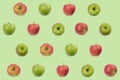 Colorful fruit pattern of fresh red, green apples on green background. texture design for textiles, wallpaper, fabric. From top Royalty Free Stock Photo