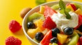 A colorful fruit salad topped with a dollop of creamy custard, a refreshing dessert Royalty Free Stock Photo