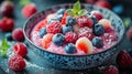 Colorful Fruit Smoothie Bowl with Fresh Berries and Mint Garnish Royalty Free Stock Photo