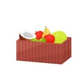 Colorful fruit in wooden large rectangular box isolated over white background Royalty Free Stock Photo