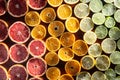 Colorful fruits backround. citrus slices, orange, lemon, lime and grapefruit. Top view Royalty Free Stock Photo