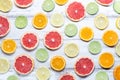 Colorful fruits backround. citrus slices, orange, lemon, lime, and grapefruit white wooden background. Top view