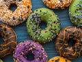 Colorful fun donuts with sugar eyes and sprinkles for Halloween Royalty Free Stock Photo