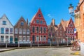 Colorful fun houses on the Bruges canal, Belgium Royalty Free Stock Photo