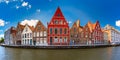 Colorful fun houses on the Bruges canal, Belgium Royalty Free Stock Photo