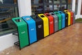 Colorful garbage bins for recycling, garbage separation. Containers for glass, paper, general waste, plastic, aluminum cans. Royalty Free Stock Photo