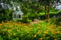 Colorful garden and gazebo in a park in Alexandria, Virginia.