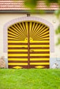 Colorful gate to the house in Holasovice, Czech Republic. Royalty Free Stock Photo