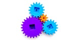 Colorful gears for ideal team work technology white table background top view mock-up