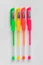 Colorful gel neon pens on white background Royalty Free Stock Photo