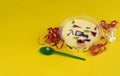 Colorful gelatin over yellow background. Brazilian famous sweet