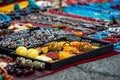 Colorful gemstone necklaces and pendants for sale in the market Royalty Free Stock Photo