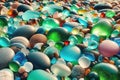 Colorful gemstones on beach. Green, blue shiny glass with multi-colored sea pebbles close-up. Beach summer background