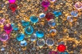 Colorful gemstones on the beach