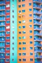 Colorful geometric apartment building facade with windows