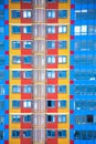 Colorful geometric apartment building facade with windows