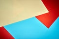 Colorful geometric texture paper pattern in yellow, blue, red