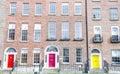 Colorful Georgian doors in Dublin (red,pink,yellow) Royalty Free Stock Photo