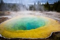 Colorful geyser basin with boiling water from geothermal heat Royalty Free Stock Photo