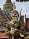 Colorful giant daemon guardian statue at Wat Arun Temple in Bangkok, Thailand Royalty Free Stock Photo