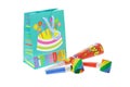 Colorful gift bag and party blowers