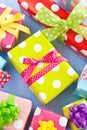Colorful gift boxes wrapped in dotted paper