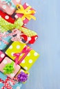 Colorful gift boxes wrapped in dotted paper