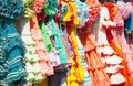 Colorful gipsy dresses in rack hanged in Spain Royalty Free Stock Photo