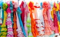 Colorful gipsy dresses in rack hanged in Spain