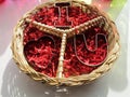 Round wicker peace basket, I Heart u cookie cutters, reflections Royalty Free Stock Photo