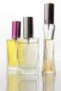 Colorful glass of bottle on white background isolated, colorful perfume bottles