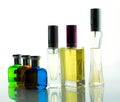 Colorful glass of bottle white background isolated, colorful perfume bottles