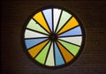 Colorful glass circle on brick wall Royalty Free Stock Photo