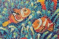 Colorful glass mosaic art shape fish. Royalty Free Stock Photo