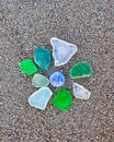 Colorful glass pieces polished by the sea Royalty Free Stock Photo