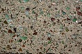 Colorful glass shivers in concrete, unique background Royalty Free Stock Photo