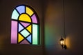 Colorful glass window with lamp light Royalty Free Stock Photo